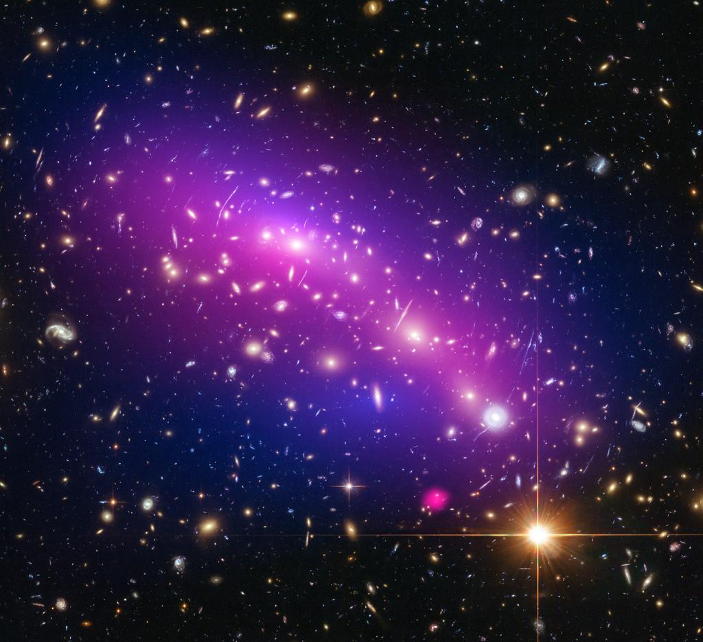 ARCH 0 AC J0.-0 Astronomers can use galaxy clusters to help limits on how dark matter the mysterious substance that makes up most of the matter in the Universe interacts with itself. AC J0.-0 is one galaxy cluster that is part of a large observing campaign by Chandra and other telescopes to do just that.
