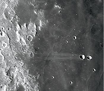 hold your attention. To the north, the crater Gassendi A has broken its wall.