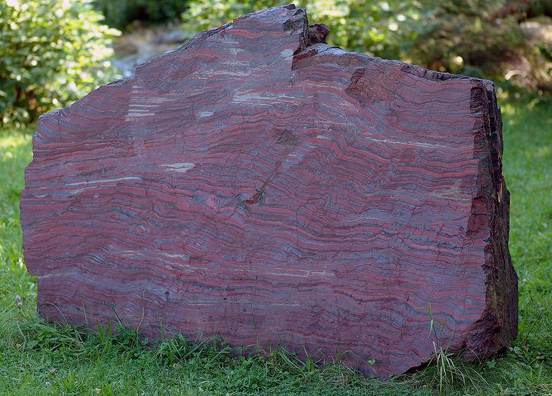 Banded iron formation, 2.1 Ga (Early Proterozoic - Canada) - oxidation of iron in the oceans and deposition of oxide on the seafloor.