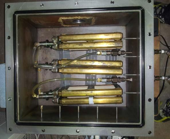 Three pairs of adsorption cores were connected in series in the adsorber, and each pair was composed of two flat webbed tube and corrugated fin heat exchangers in