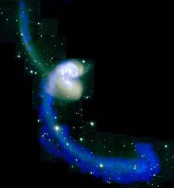 ULTRALUMINOUS INFRARED GALAXIES (ULIRGS) Antennae: an example of an interacting ULIRG Discovered by the Infrared Astronomical Satellite (IRAS) in 1983 ULIRGs emit most of