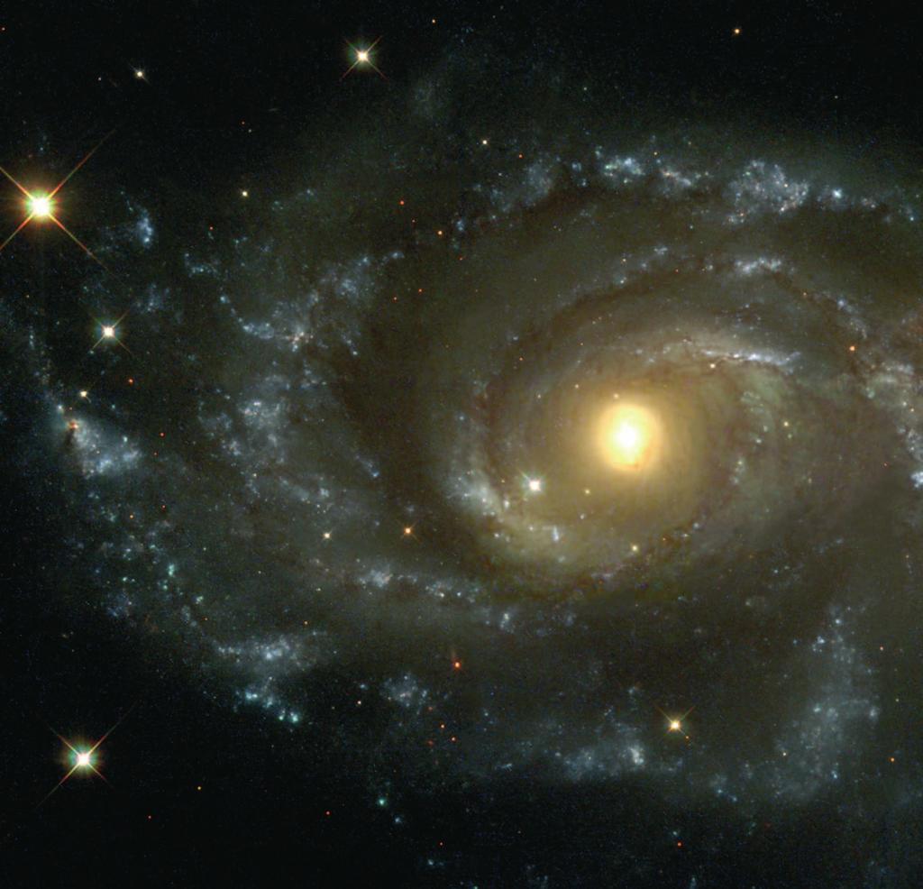 Grazing Encounter Between two Spiral Galaxies In the direction of the constellation Canis Major, two spiral galaxies pass