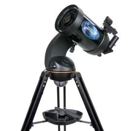 Includes two eyepieces & red-dot finder. Stand on a low garden table.