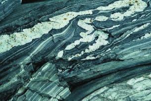While metamorphic rocks are classified by chemical composition, they are first classified according to their texture. Metamorphic rocks have either a foliated texture or a nonfoliated texture.
