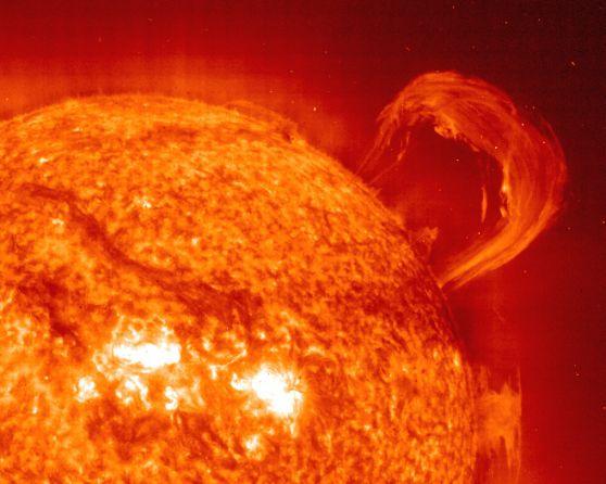Solar Prominence Composed of hot gas trapped in magnetic fields extending
