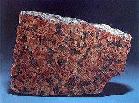 The most common type of intrusive igneous rock that we have at the Earth s surface.