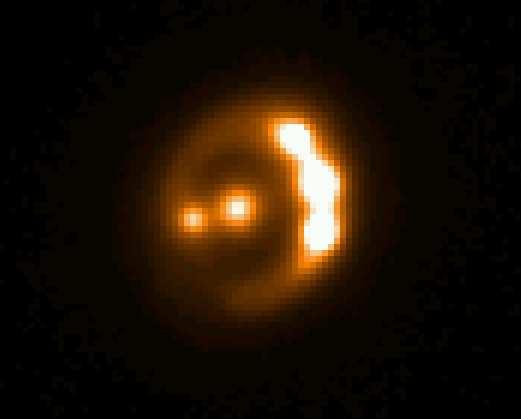 2. Gravitational lenses 6. GL MODELS; 6.2. Asymmetric lenses: 3/6/2009 11 2. Gravitational Lenses: 6. GRAVITATIONAL LENS MODELS: 6.2. Asymmetric lenses: An optical Einstein ring altogether with a quadruply imaged quasar (RXS J1131-1231) has recently been discovered by the Liège group and is shown on the above slide (Sluse et al.
