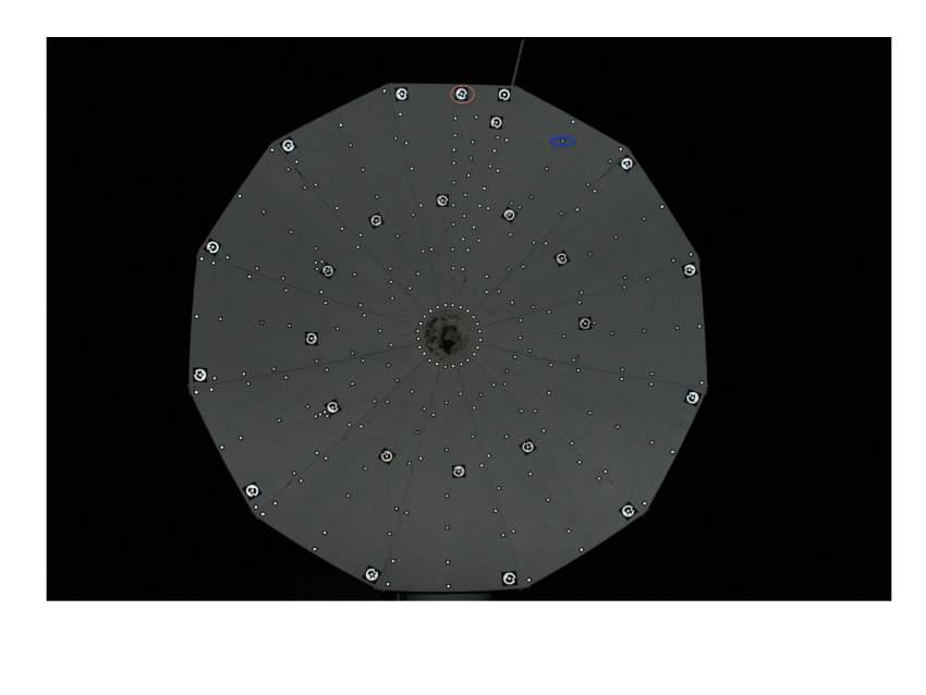 2.4 Photogrammetry Targets Geometrically coded and circular uncoded black adhesive stickers in Figure (2.4)a, were hand pasted on the primary reflector.