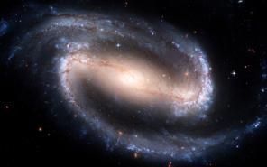 Barred- Spiral Galaxy SB Named so because it reminded Hubble of a spiral with a solid bar across the