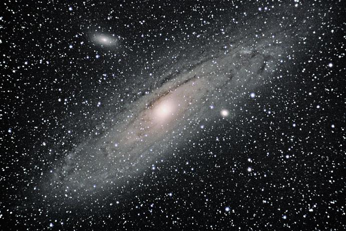 Urban Astronomy 153 Fig. 10.3 M31, the Andromeda Galaxy Theoretically video cameras should perform similar to the example discussed in Chap. 4 for broadband unfiltered artificial sky glow.