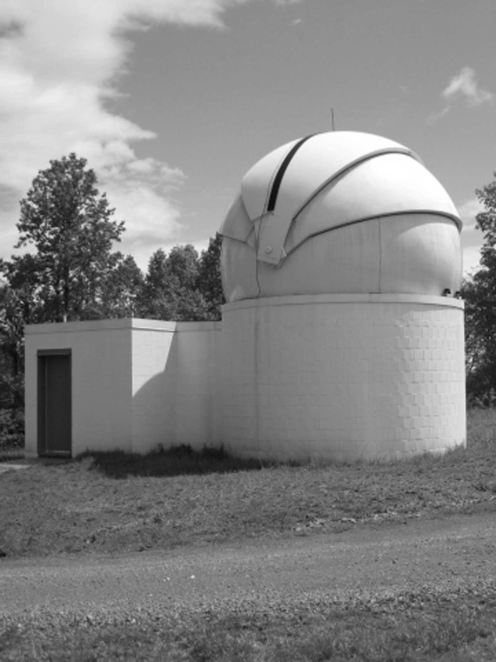 The Norfolk State University 24-inch Rapid Response Robotic Telescope at Fan Mountain (Rev. September 12, 2012) 1. Introduction Figure 1. The Norfolk State University RRRT Observatory at Fan Mountain.