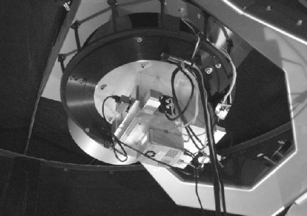 Figure 9. The RRRT TopBox mounted on the telescope. yielding independent measurements of both linear Stokes parameters for point sources in the CCD field of view by differential photometry.