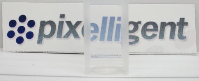 Figure 1. Top picture, PGMEA solvent in a cuvette. Below, examples of PixClear dispersions with different compatibility levels: clear, slightly hazy to very hazy.