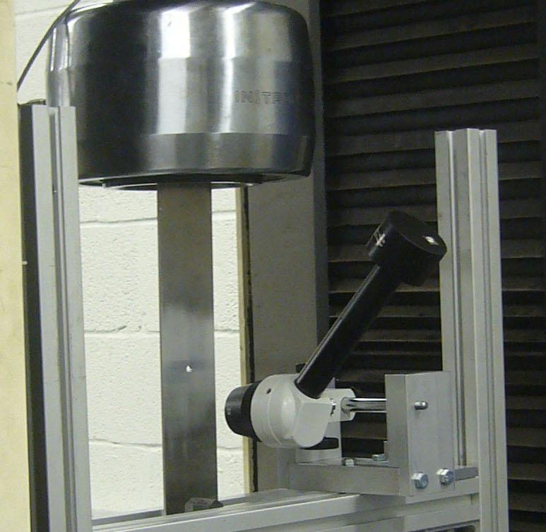Tensile Specimen A1014 T6 Laser Interferometer Transducer (a) Fig. 1.