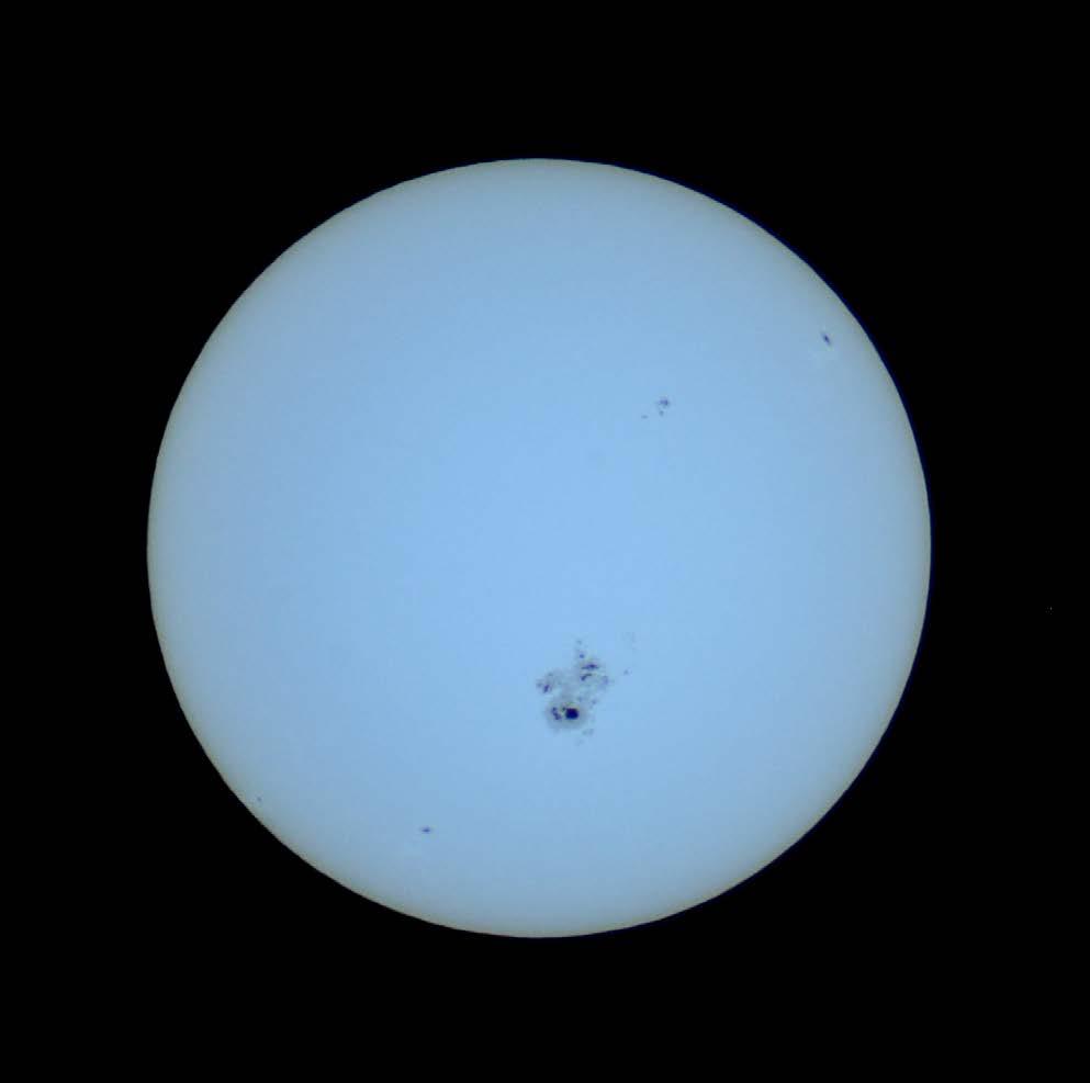 The huge extent of AR 2192 is evident in this shot by Ray Hayes with a Baader filter on his 4 refractor.
