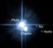 Pluto's largest moon, Charon, was discovered in 1978.