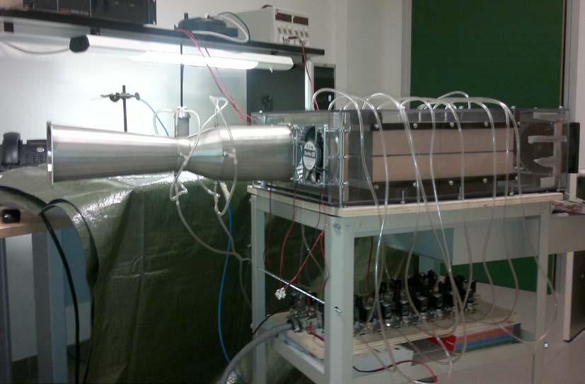 Figure. View of the experimental setup. Figure 3. Longitudinal section of the finned duct with the location of the static pressure taps along the test section.