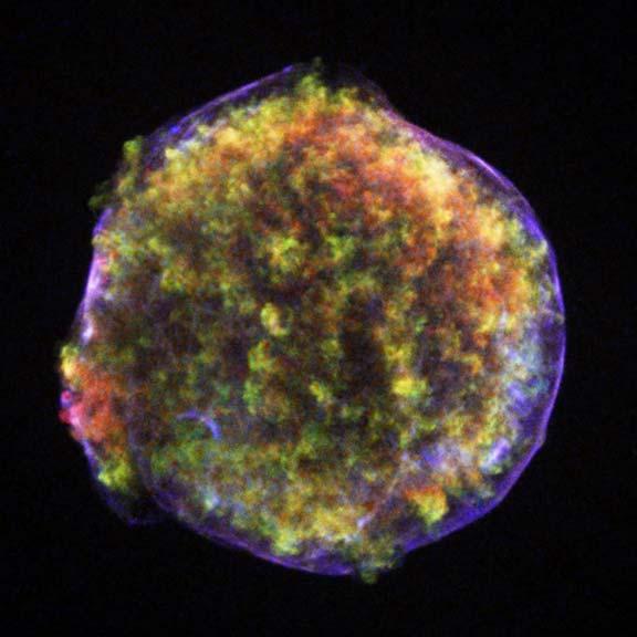 Tycho s SNR A Chandra image of Tycho s SNR (X-ray); This image of the supernova remnant shows an expanding bubble of multimillion degree debris (green and red) inside a more rapidly moving shell of