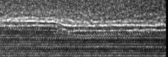 b Phase image from the same area of graphene as in a light gray yellow vs dark gray brown regions: 1 ML graphene vs 2 ML graphene see discussion in text.