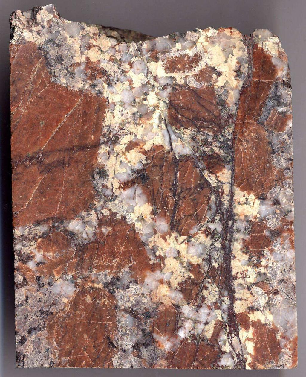 Reservoir Types: Granites Granite characteristics: Igneous rock (intrusive) Mineralogy Quartz, feldspar, mica Secondary minerals: calcite, quartz, clay minerals (illite, chlorite, kaolinite,