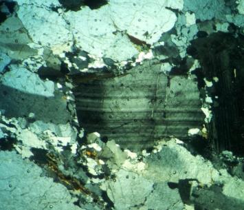 Characteristic for this partial recrystallization is a bimodal distribution of grain size, with large old plagioclase crystals and small new, recrystallized crystals.