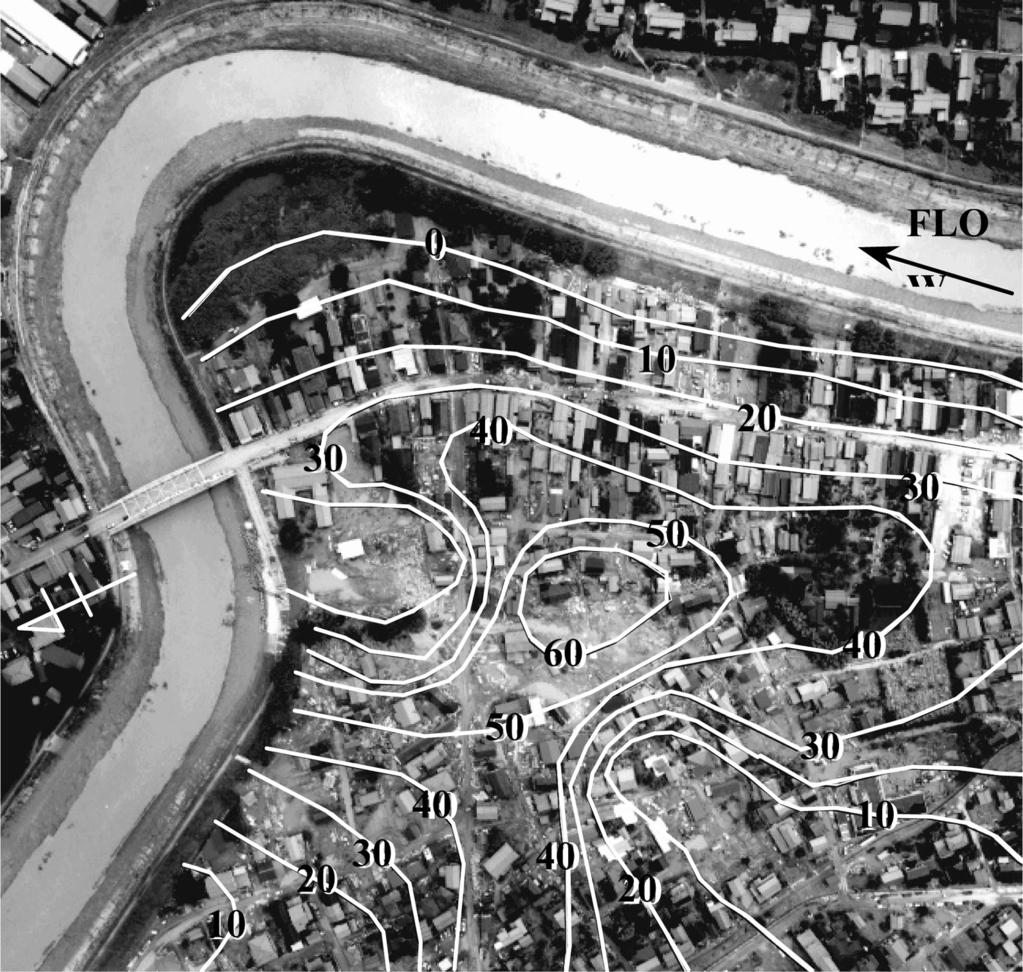disaster. Photo 2 shows contour lines of height of sediment deposition on aerial photograph after flood disaster. Houses to be washed out gathered along east-west road and around broken dyke.