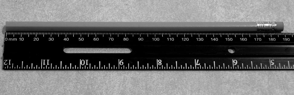 D Example 2: Measuring objects correctly Look at the picture above. How long is the pencil? 1. Report the length of the pencil to the nearest 0.