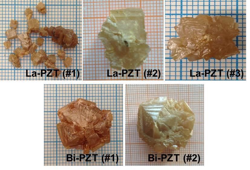 5.4. Results and discussion 5.4.1. Crystal growth and composition analysis Figure 5.1 shows the as-grown La-PZT and Bi-PZT single crystals.