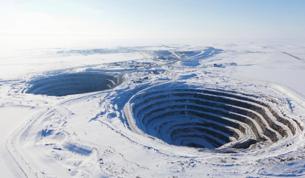 FIGURE 1.17 An open pit diamond mine in the Northwest Territories in Canada I wonder if this land will ever go back to the way it was?