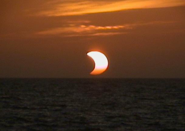 The second type of solar eclipse is a partial solar eclipse. It happens when the sun, moon and Earth are not exactly lined up.