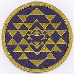 It is an embroidered patch and measures 2-1/2".