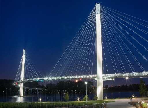 The walking trail connects to the Bob Kerrey Pedestrian Bridge that spans the river and joins Omaha with