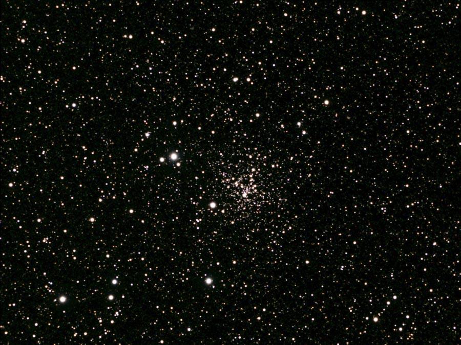 6-inch) f/6 achromatic refractor using a 26 mm eyepiece. The cluster was an unresolved blur that was easily distinguishable in the eyepiece as a deep space object.