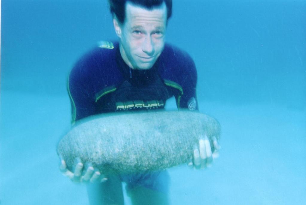 So if you lifted a 200 pound rock underwater, which displaced