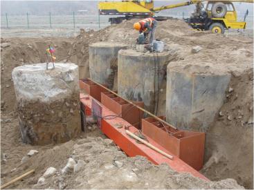 Embedded piles for large tanks on