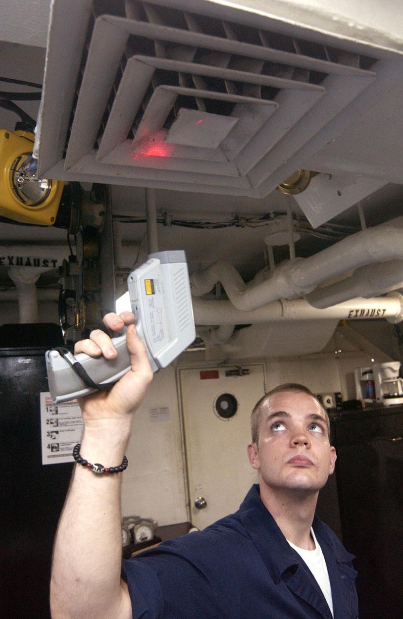 OpenStax-CNX module: m42214 4 Figure 3: Fireman Jason Ormand uses a pyrometer to check the temperature of an aircraft carrier's ventilation system.