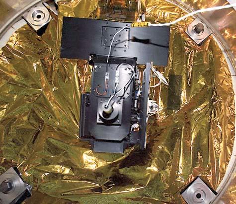 54 cm Figure 1. The Global Ultra-Violet Imager, GUVI, is located on the bottom (nadir-viewing) surface of the spacecraft, inside the adapter ring, the mechanical interface to the launch vehicle.