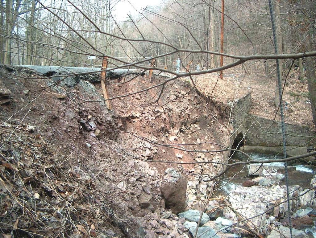 This is a photograph of embankment erosion damage.