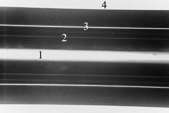 Measurement of the capillary radius with a microscope Due to refraction and total reflection, the image appears in the field of view of the microscope as bright and dark areas. Fig.