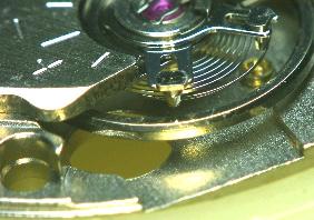 5) Engage the balance-spring with the slit of the REGULATOR PIN.