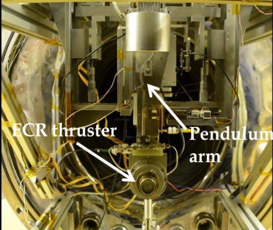 Picture of the ECR-PM-V1 thruster operating with xenon in the ONERA s B09 facility A parametric study over the thrust geometry has been led, and the thruster performances are compared.