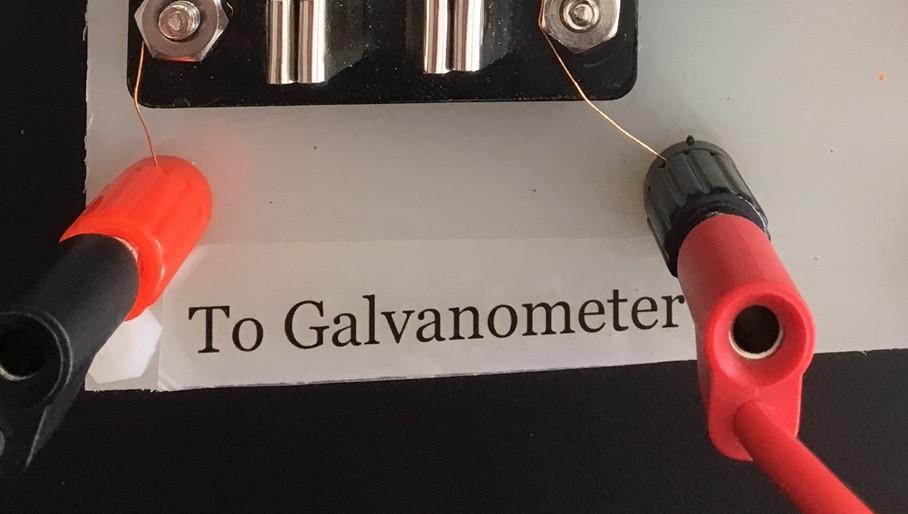 5. Check that the galvanometer needle has stabilized at the zero mark. Throw the switch over to the second position such that the charged capacitor is now discharged through the galvanometer.