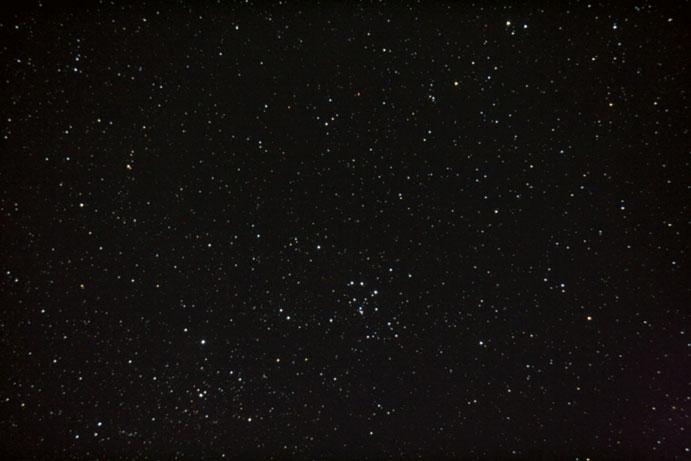 30 2 The Messier Objects Fig. 2.18 Photo of M18; 14 30 s exposures, ISO 1600, Canon Rebel XT 350D camera with 200 m f/6 telescope. North is up and east is to the left.