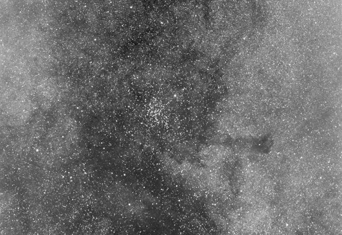 36 2 The Messier Objects Fig. 2.23 Photo of M23; 5 min exposure on hypered Kodak Tech Pan with 8 f/1.5 Schmidt camera. North is up and east is to the left.