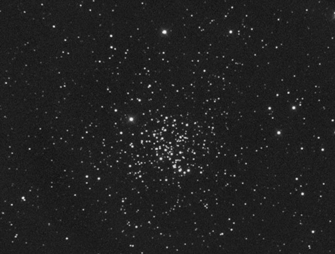 88 2 The Messier Objects Fig. 2.67 Photo of M67; 30 min exposure on hypered Kodak Tech Pan film, 8 f/6 telescope. North is up and east is to the left.