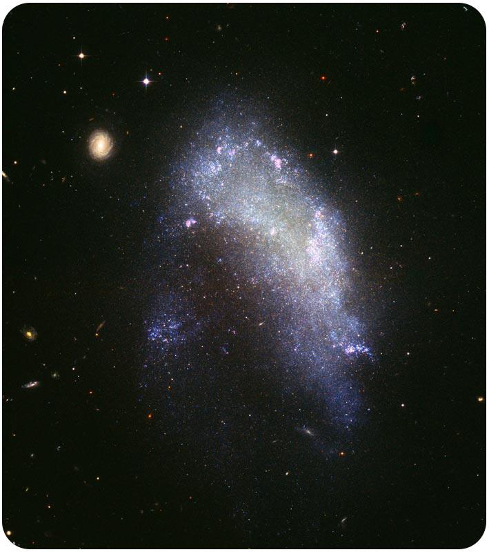 www.ck12.org Chapter 1. Galaxies FIGURE 1.6 This irregular galaxy, NGC 55, is neither spiral nor elliptical. FIGURE 1.7 The Milky Way Galaxy in the night sky above Death Valley.