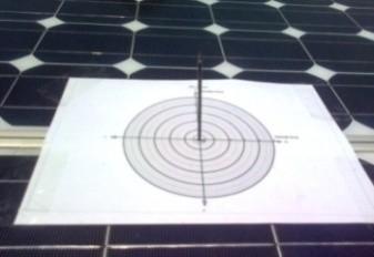 (Figure -a) shows the adopted practical procedure to measure this angle. Practically, the tracker was turned off at 11:00 on 3 rd April 2012 so as to measure the incident angle of the sun's ray.