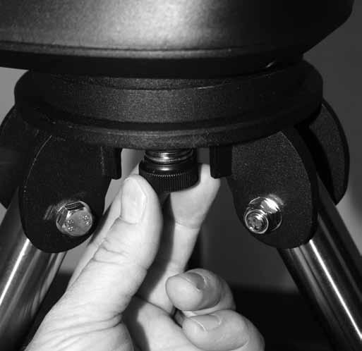 A A B Figure 5. A) Wrap the strap around a tripod leg and pull tight before fastening. B) The hand controller bracket installed.
