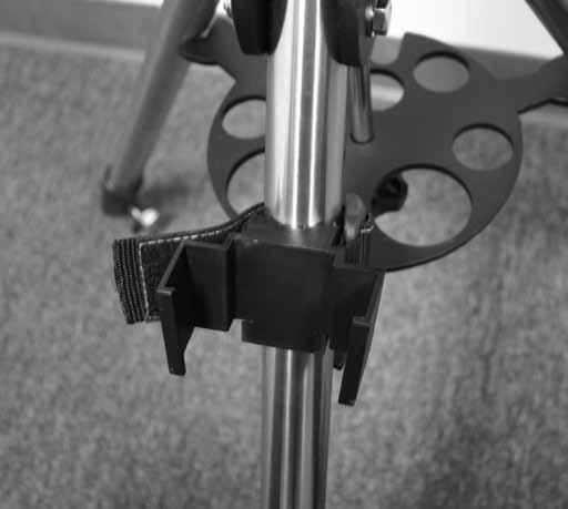 Extend the inner portion of each leg to the desired length. Then tighten the tripod leg clamp knob to secure each leg in place.