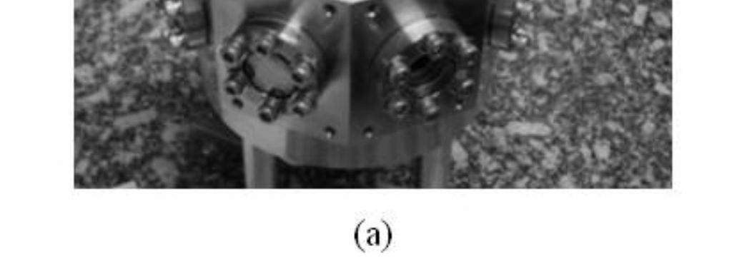 Figure 1- (a) View of the vacuum chamber built for the compact clock project (b) Cutting view of the